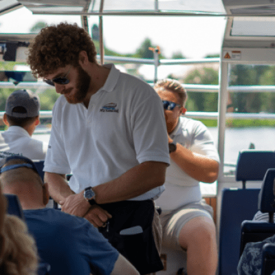 a group of people sitting in front of a building