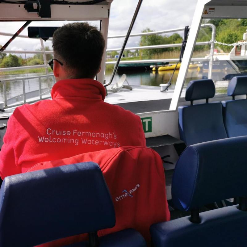 a boy sitting on a bus