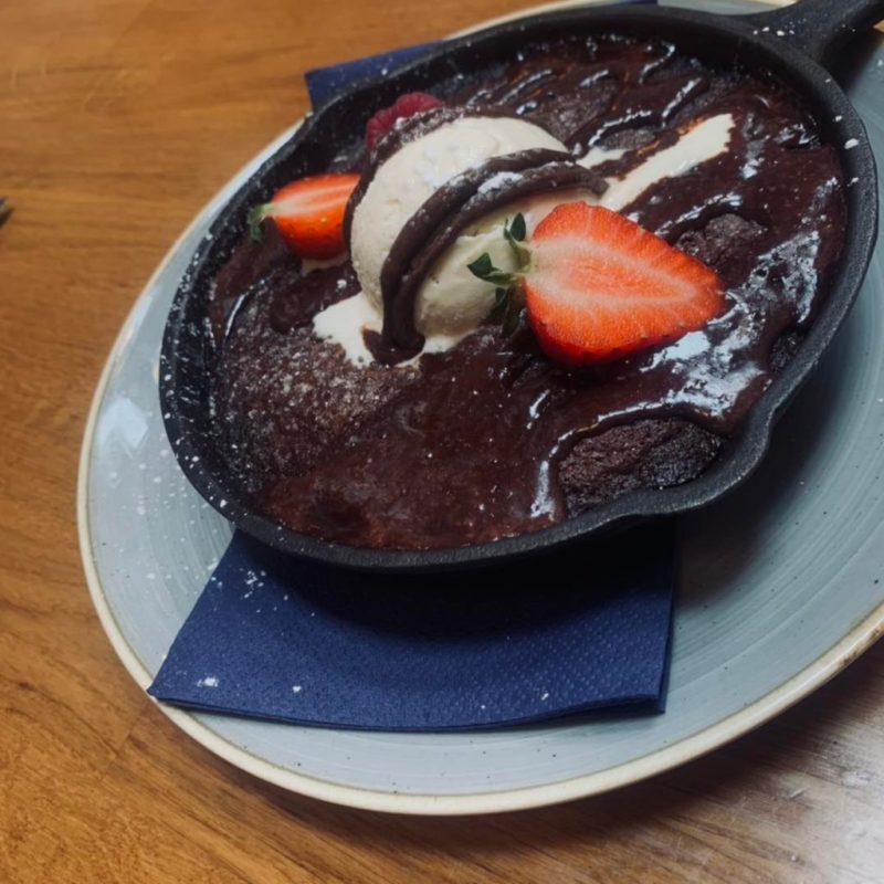 a piece of chocolate cake on a plate